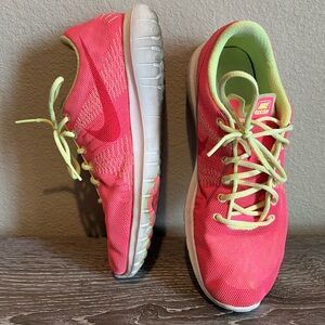 Nike Women's Pink and neon yellow/green Athletic Shoes 7y equal to 8.5 women’s
